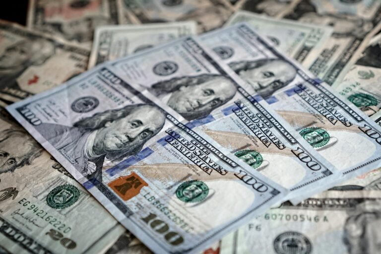 stack of us dollar bills for finance concepts