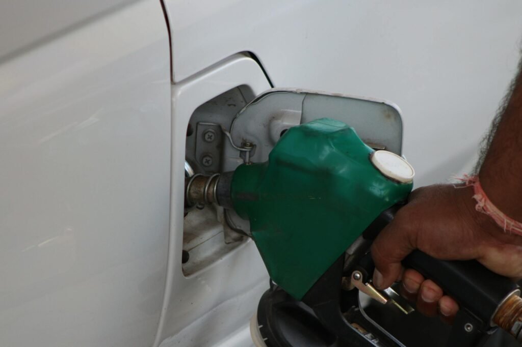 fuel pumping into car at a gas station
