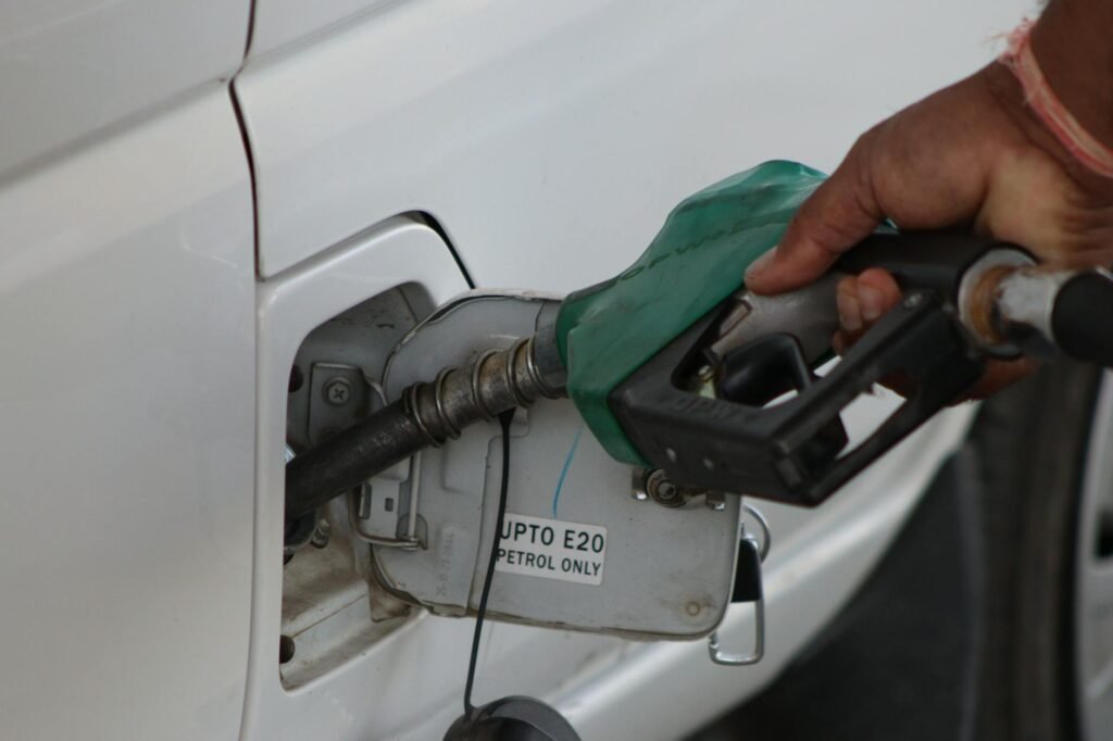 close up of fuel pump in action at gas station