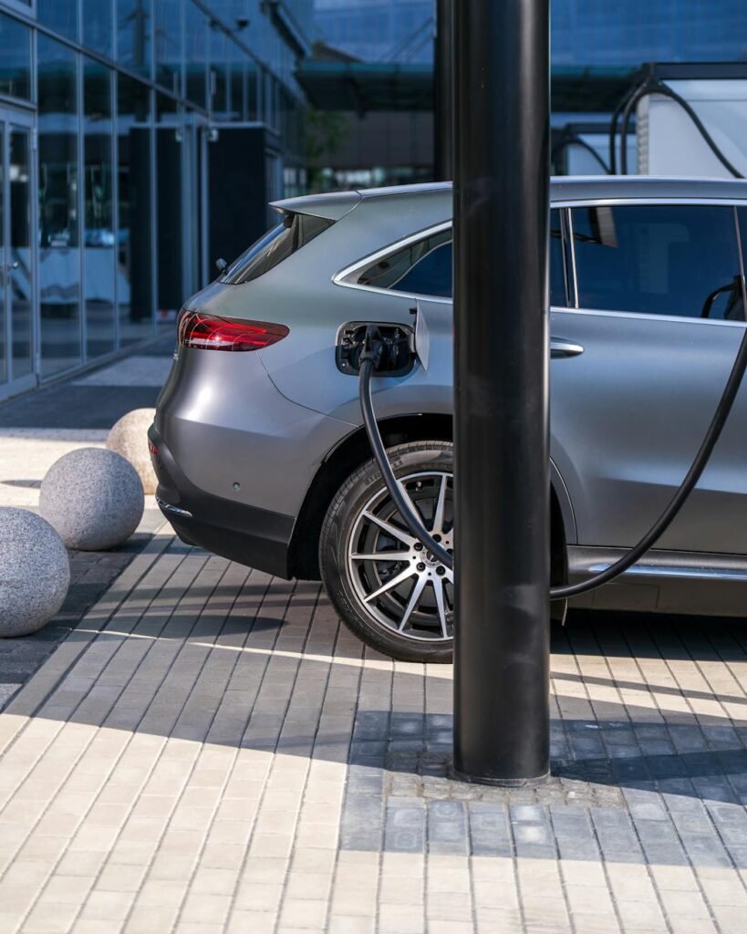 electric car charging at modern urban station