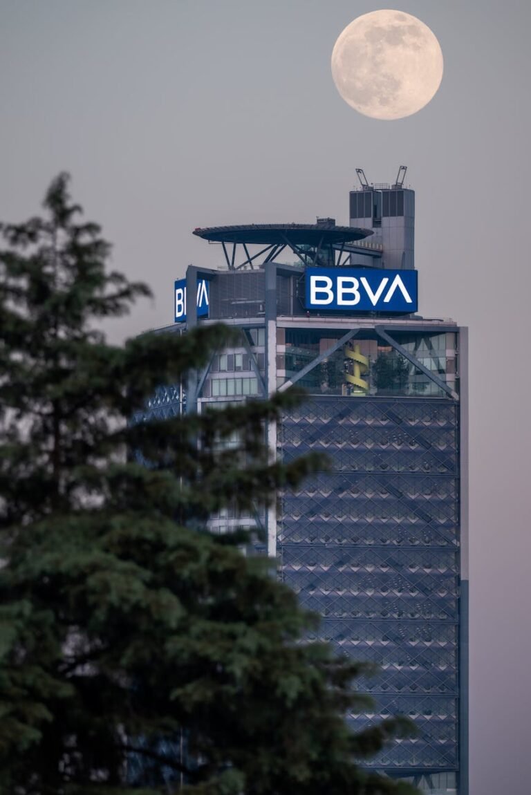 bbva tower under full moon in mexico city