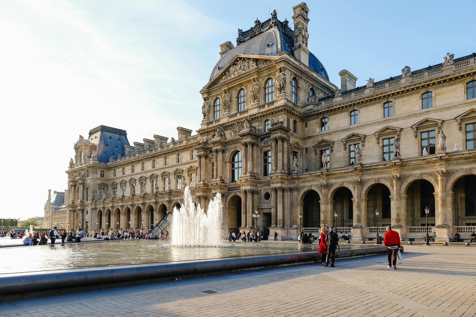photo of people near water fountain