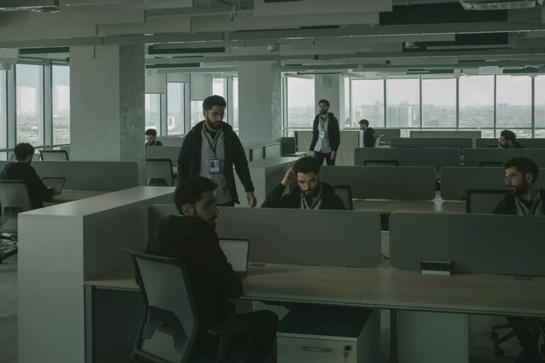 men looking alike inside an office